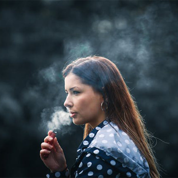 a person using a vape for how to vape