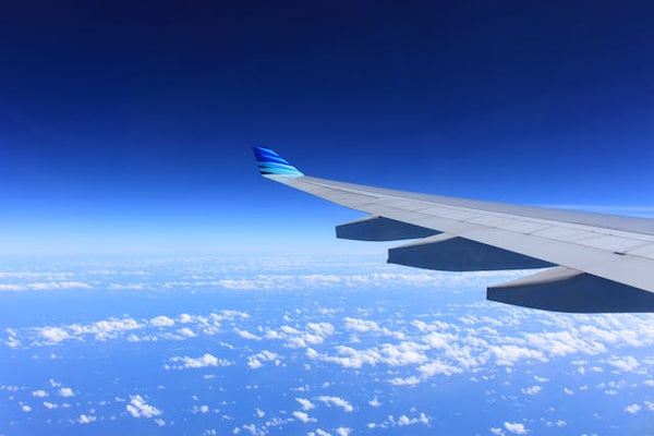 an airplane in flight for can you bring a vape on a plane