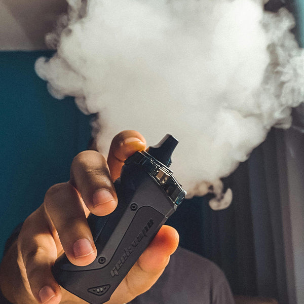 guy showing off vape device